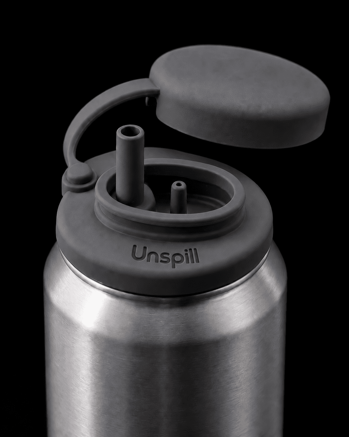 Close view of a Charcoal Unspill silicone can cover fitted to a can